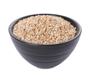 Beyaz kasedeki kuru buğday inlemeleri.