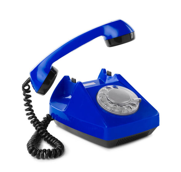 Old blue telephone with rotary dial isolated on white