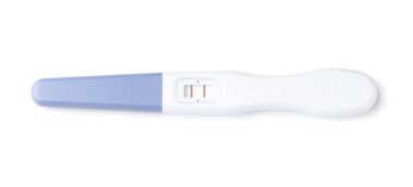 Bir hamilelik testi beyaza izole edilmiş, üst görünüm