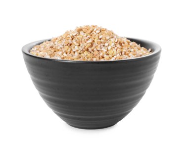 Beyaz kasedeki kuru buğday inlemeleri.