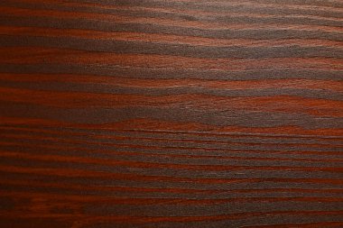 Ahşap yüzey dokusu arka plan olarak ceviz ağacı ahşap lekesini uyguladıktan sonra, üst görünüm