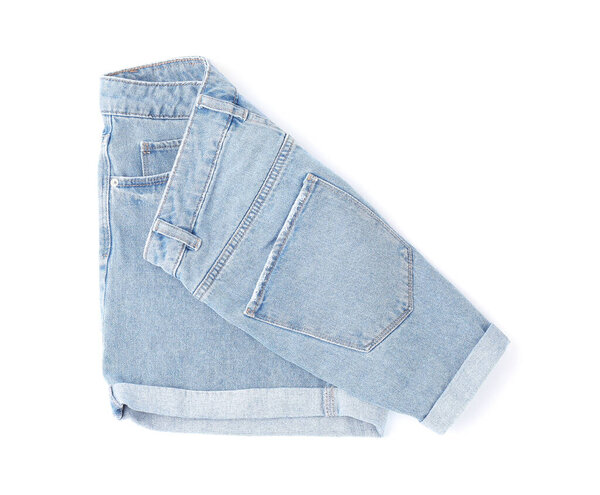 Stylish light blue denim shorts isolated on white, top view