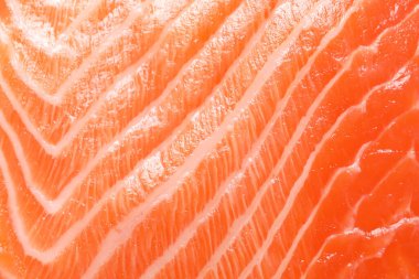 Arka plan olarak taze somon, yakın plan. Deniz yiyeceği