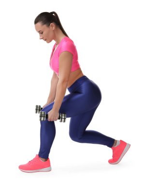 beyaz zemin üzerine dumbbells ile egzersiz kadın