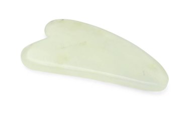 Bir gua sha aracı beyaz üzerinde izole