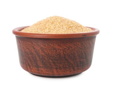 Beyaz kasede çiğ buğday inliyor.