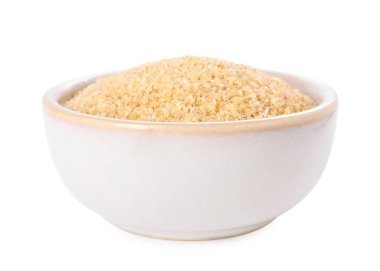 Beyaz kasede çiğ buğday inliyor.