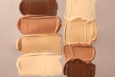 Bej arkaplan ve üst görünümde farklı temellerin örnekleri