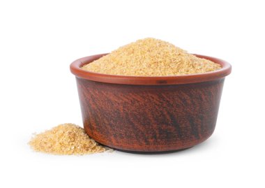 Beyaz kasede çiğ buğday inliyor.