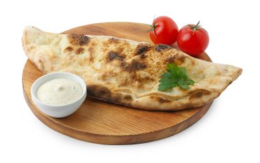 Soslu, taze domatesli ve beyaz maydanozlu leziz calzone.