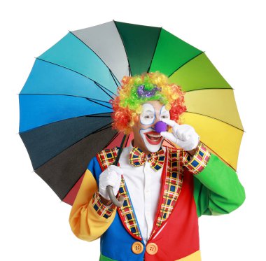 Happy clown with colorful umbrella beeping his nose on white background clipart