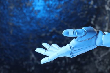 Yapay zeka. Bulanık arkaplanda robot el hareketi, metin için boşluk