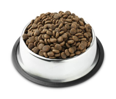 Beslenme kabının içindeki kuru yiyecek tanecikleri beyazın üzerinde izole edilmiş.