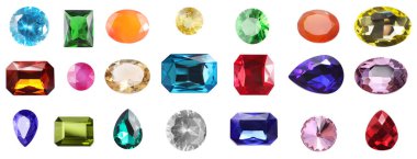 Beyaz zemin üzerinde birçok farklı parlak değerli taşlar, set