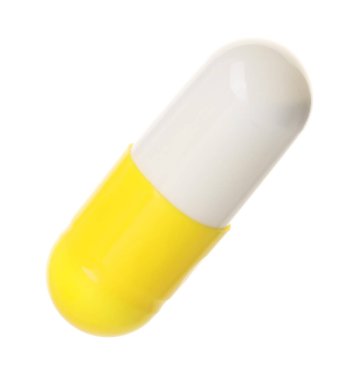 Beyaza izole edilmiş bir antibiyotik hapı. Tıbbi tedavi