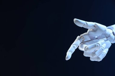 Yapay zeka. Robot el koyu mavi arkaplanda bir şeye işaret ediyor, metin için boşluk