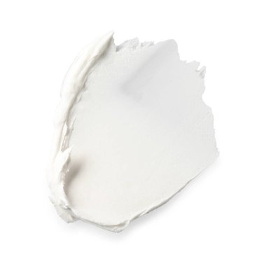 Krema beyaza izole edilmiş, üst manzara. Kozmetik ürün örneği