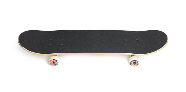 One modern skateboard with black griptape isolated on white