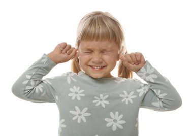 Little girl covering her ears with fingers on white background clipart