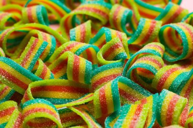 Arkaplan olarak gökkuşağı ekşi kemerleri, yakın plan