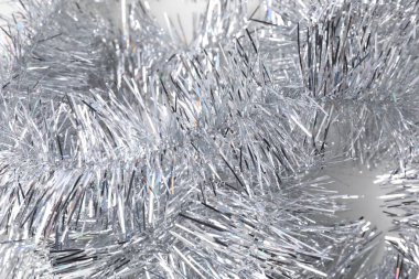 Arkaplan olarak parlak gümüş süsleme, yakın görünüm
