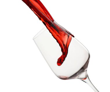 Beyaz bardağa kırmızı şarap dökülüyor.