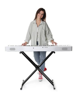 Smiling woman playing synthesizer on white background clipart