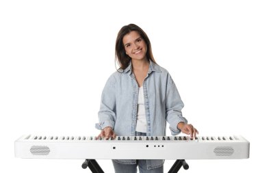 Smiling woman playing synthesizer on white background clipart