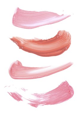 Beyaz arkaplanda farklı renk tonlarının dudak parlatıcısı, örnek kümesi