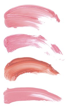 Beyaz arkaplanda farklı renk tonlarının dudak parlatıcısı, örnek kümesi