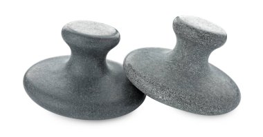 Beyaz üzerine izole edilmiş masaj taşları. Spa tedavisi