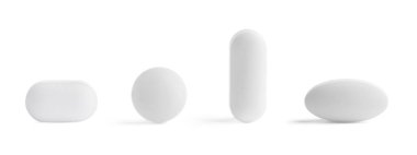 Sıraya dizilmiş farklı haplar beyaz, set