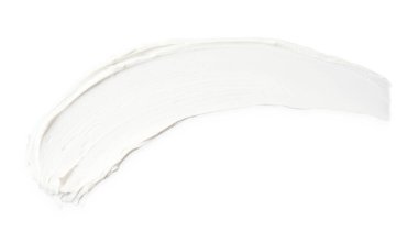 Krema beyaza izole edilmiş, üst manzara. Kozmetik ürün örneği