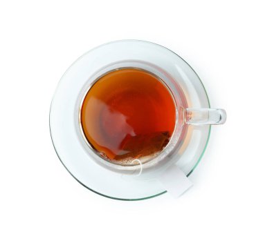 Cam bardakta çay poşeti, sıcak içecek, beyaz, üst manzara.