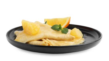 Delicious Crepes Suzette dessert isolated on white clipart