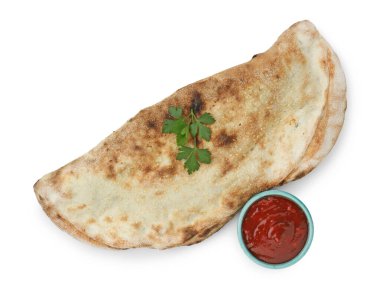 Ketçap ve taze maydanozlu nefis bir calzone.