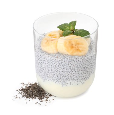 Muzlu lezzetli chia pudingi ve beyaz bardakta nane şekeri.