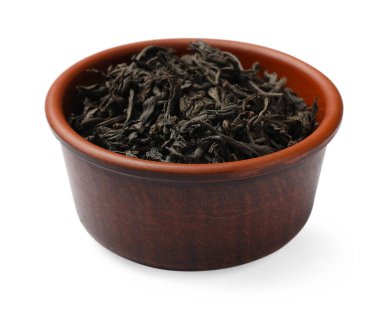 Beyaz kasedeki kuru çay yaprakları.