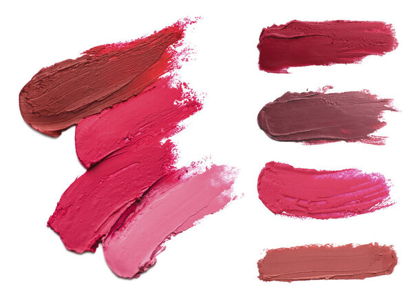 Помады разного цвета, комплект. Образцы на белом фоне, вид сверху