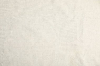 Arkaplan olarak bej masa örtüsünün dokusu, üst görünüm