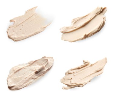 Beyaza izole edilmiş krem örnekleri.