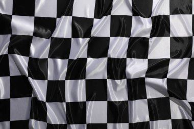 Checkered finish flag as background, top view