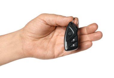 Beyaz arkaplanda araba çevirme anahtarı olan adam, yakın plan