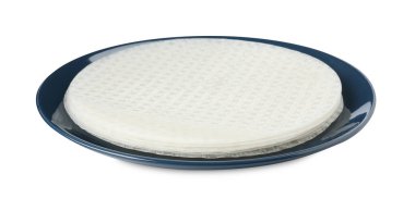 Beyaz üzerine izole edilmiş yenilebilir pirinç kağıdı yığını.