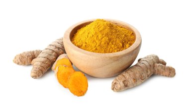 Turmeric powder in bowl and roots isolated on white clipart