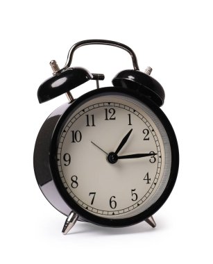 Beyaza izole edilmiş bir siyah alarm saati