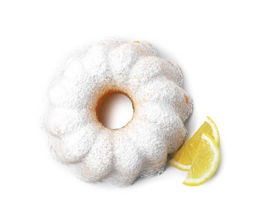 Lezzetli limonlu pasta ve taze meyve dilimleri.