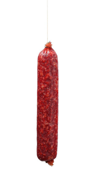 One delicious dry cured sausage isolated on white