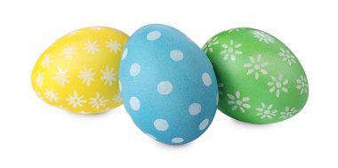 Many decorated Easter eggs isolated on white