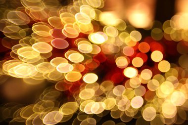 Arka plan olarak festival ışıklarının bulanık görünümü, bokeh etkisi